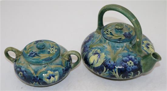 A Moorcroft late Florian tea kettle and cover, and a matching sugar bowl and cover, c.1915, teapot 16.5cm, both with repairs